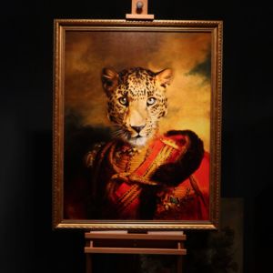 Image of a Leopard made by Tein Lucasson in a golden frame on canvas.